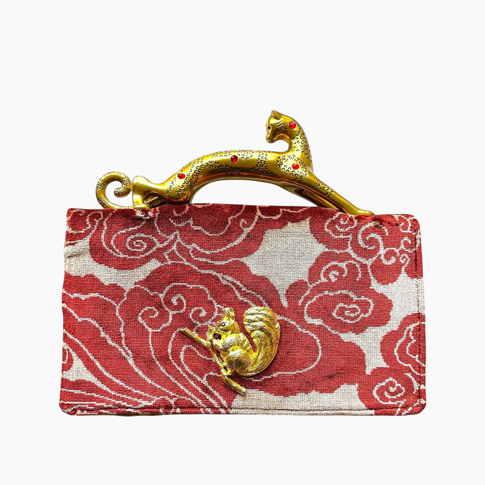 LEOPARD HANDLE CLUTCH | VELVET CLOUD