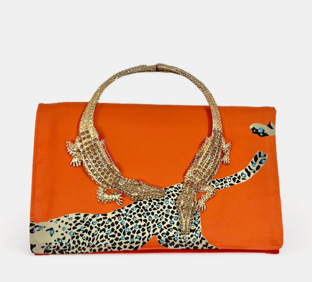 
            
                Load image into Gallery viewer, Bright Orange Leopard Clutch With Alligator Handle
            
        